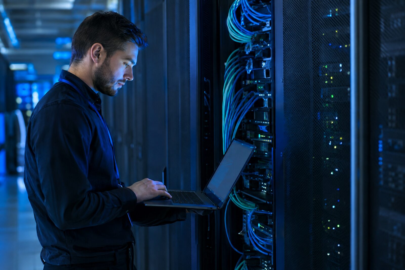 Engineer hardening servers in a server room